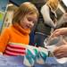 Five-year-old Maude makes an ice candle during one of many Hands-On Holidays: Hot vs. Cold exhibits Ann Arbor Hands-On Museum on Jan. 5. 
Courtney Sacco I AnnArbor.com  